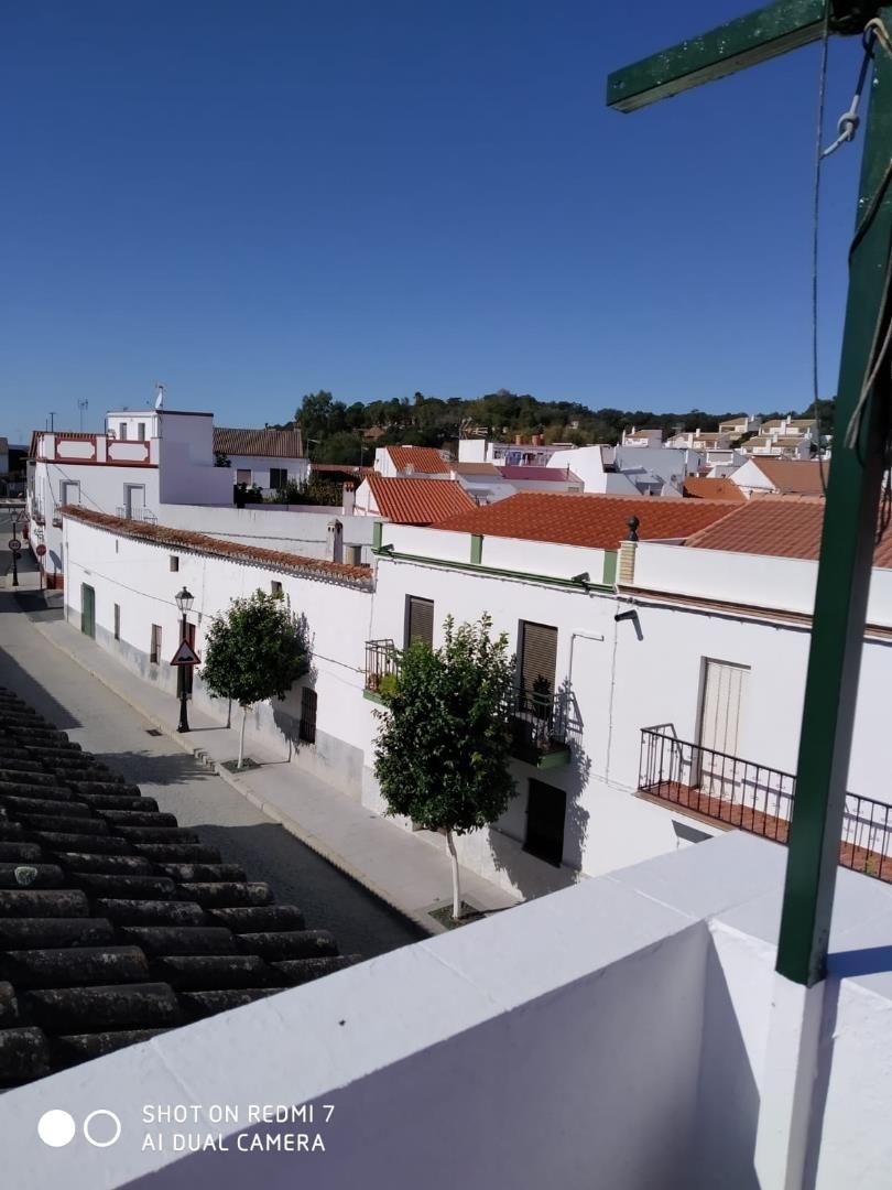 Vista exterior de Casa adosada en venda en El Ronquillo amb Terrassa, Moblat i Forn