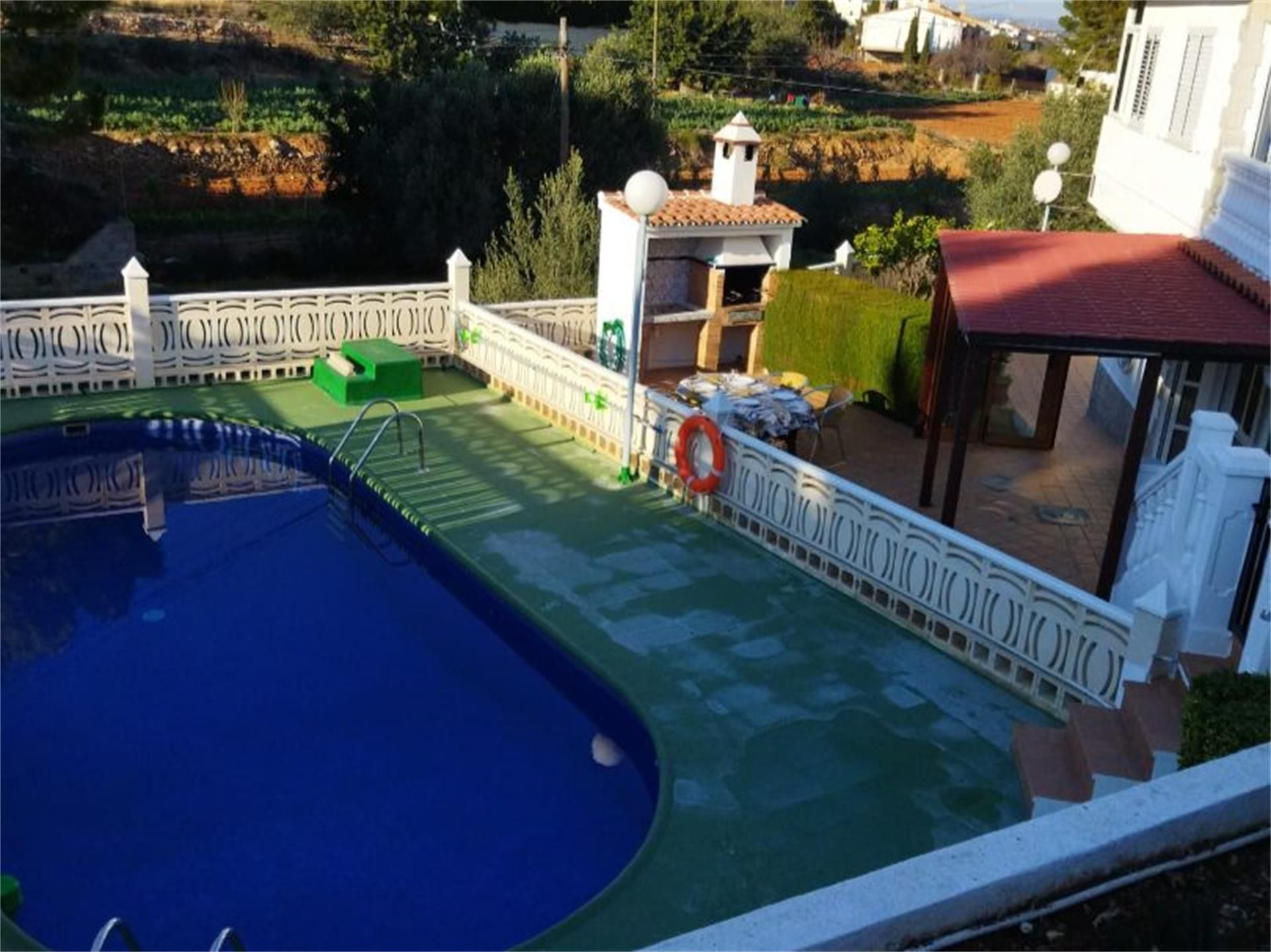 Piscina de Casa adosada de lloguer en Peñíscola / Peníscola amb Aire condicionat, Jardí privat i Terrassa