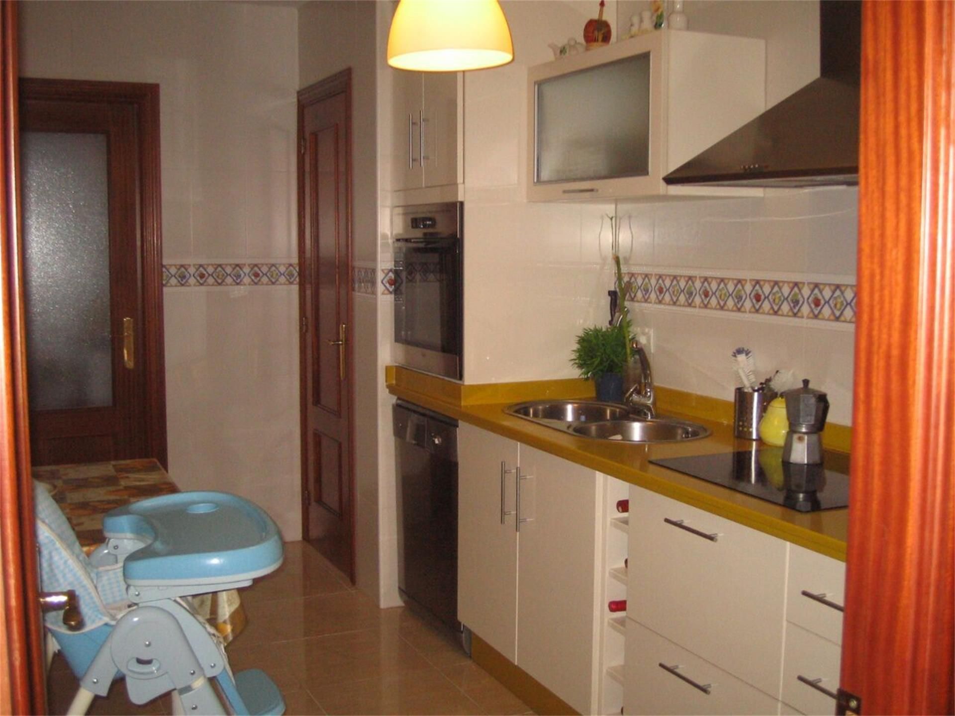Kitchen of Flat for sale in Cortegana  with Air Conditioner, Terrace and Storage room