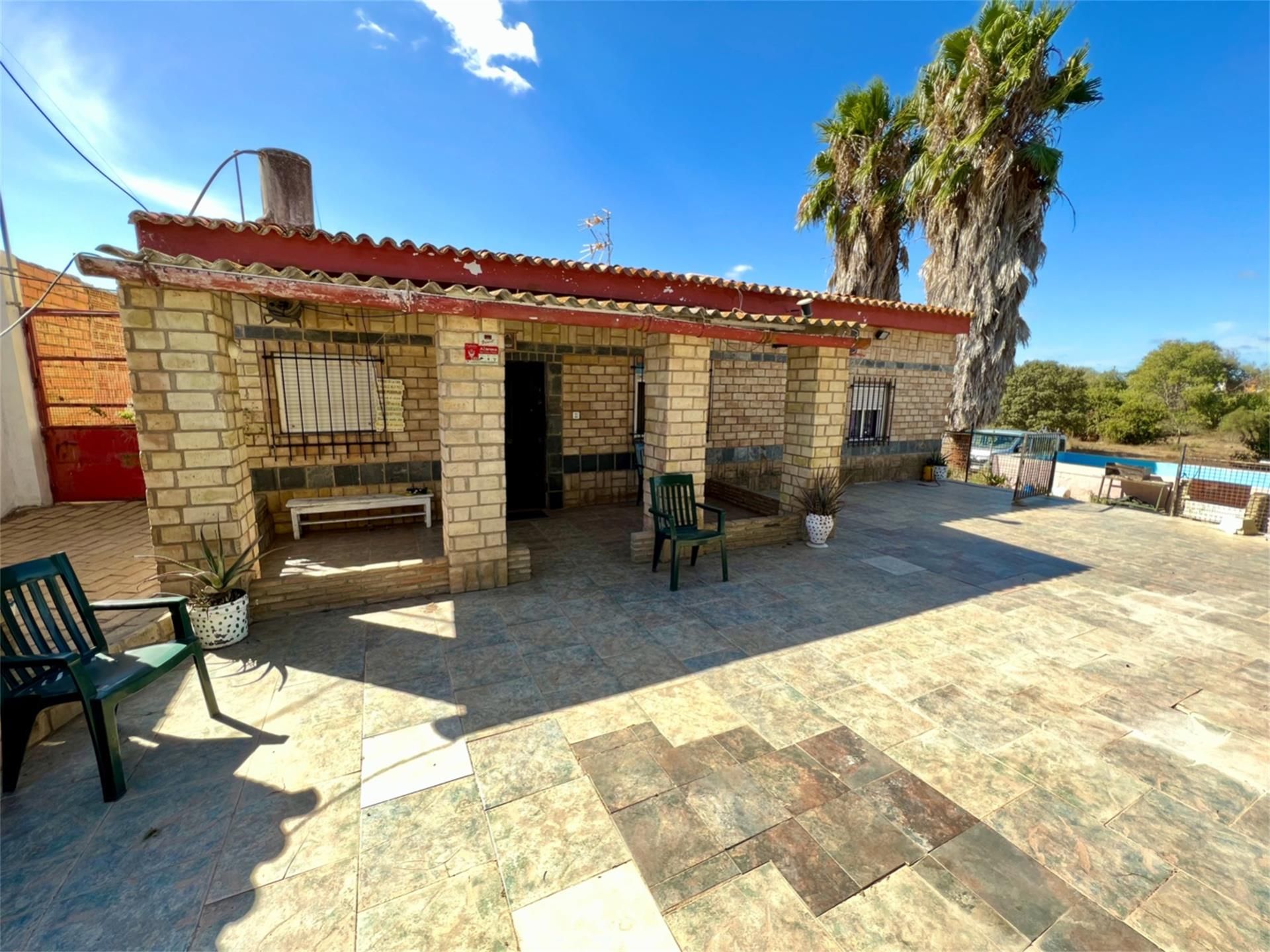 Exterior view of Country house for sale in Gibraleón  with Terrace and Swimming Pool