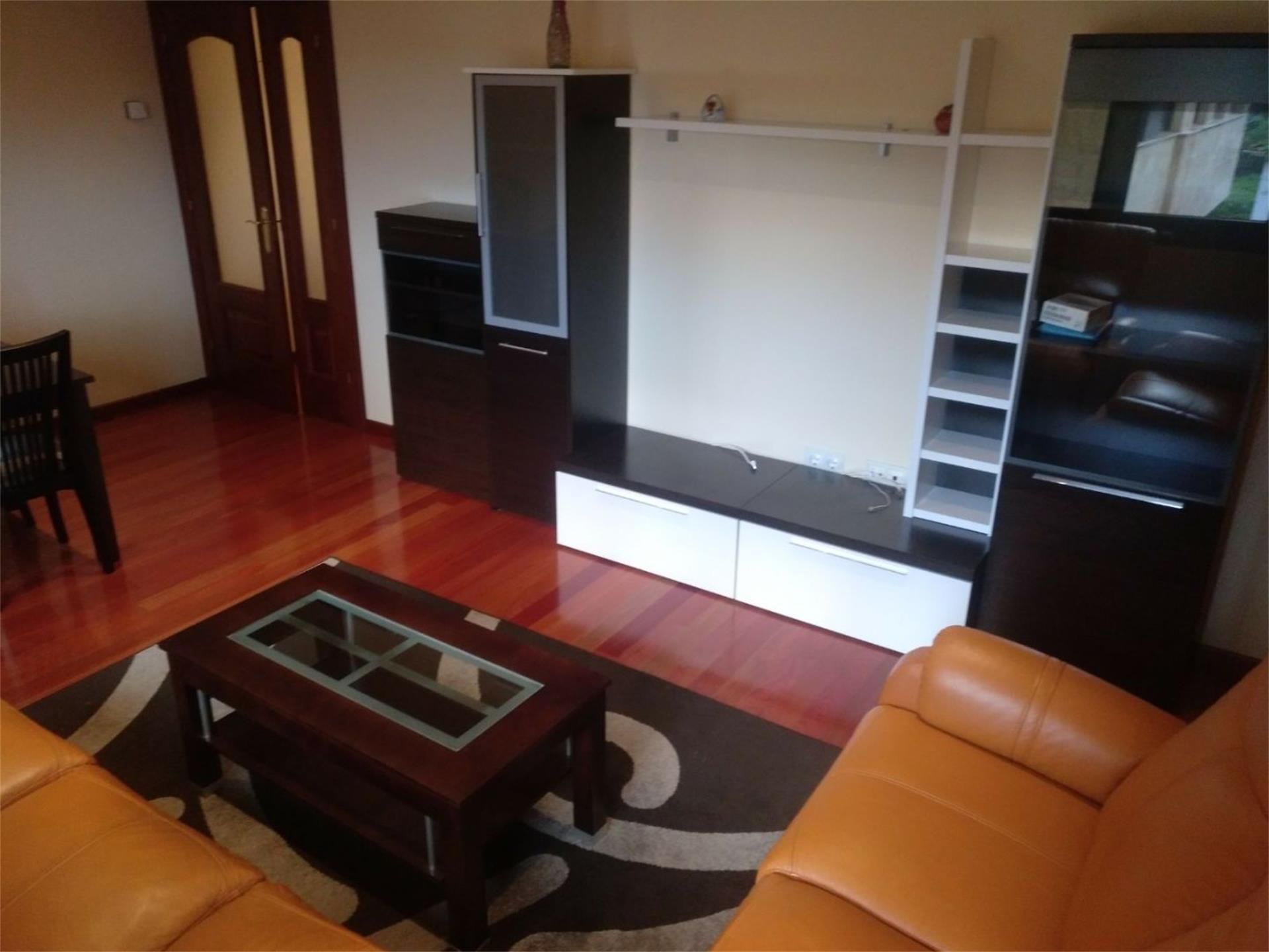 Living room of Flat for sale in Gijón   with Heating, Private garden and Parquet flooring