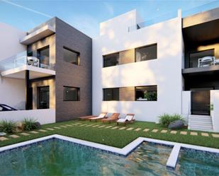 Exterior view of Single-family semi-detached for sale in Pilar de la Horadada  with Terrace and Swimming Pool