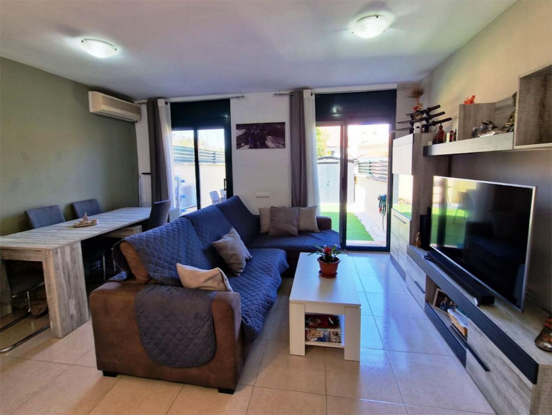 Living room of Single-family semi-detached for sale in Mont-roig del Camp  with Air Conditioner, Terrace and Swimming Pool