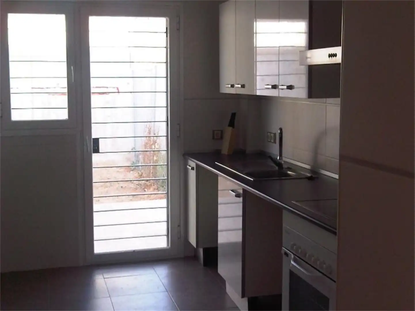 Küche von Wohnung zum Verkauf in San Nicolás del Puerto mit Privatgarten, Terrasse und Möbliert