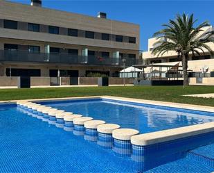 Piscina de Casa adosada en venda en La Pobla de Farnals amb Aire condicionat, Terrassa i Piscina