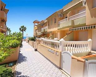 Exterior view of Single-family semi-detached for sale in La Manga del Mar Menor  with Air Conditioner, Terrace and Swimming Pool