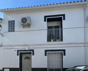 Exterior view of Single-family semi-detached for sale in El Real de la Jara  with Air Conditioner, Terrace and Balcony