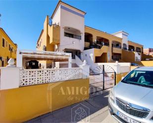 Exterior view of Single-family semi-detached for sale in Los Montesinos  with Air Conditioner, Terrace and Swimming Pool