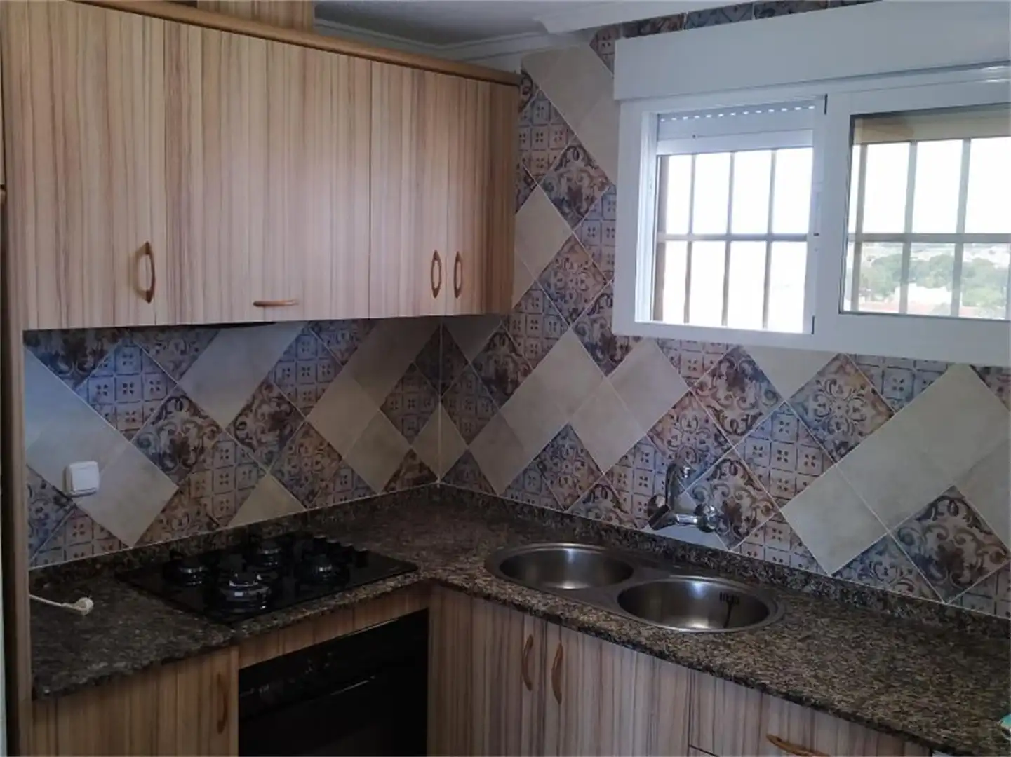 Apartament de lloguer a Edif.playa, 1, Mil Palmeras Cuina de Apartament de lloguer en Pilar de la Horadada amb Jardí privat, Terrassa i Moblat