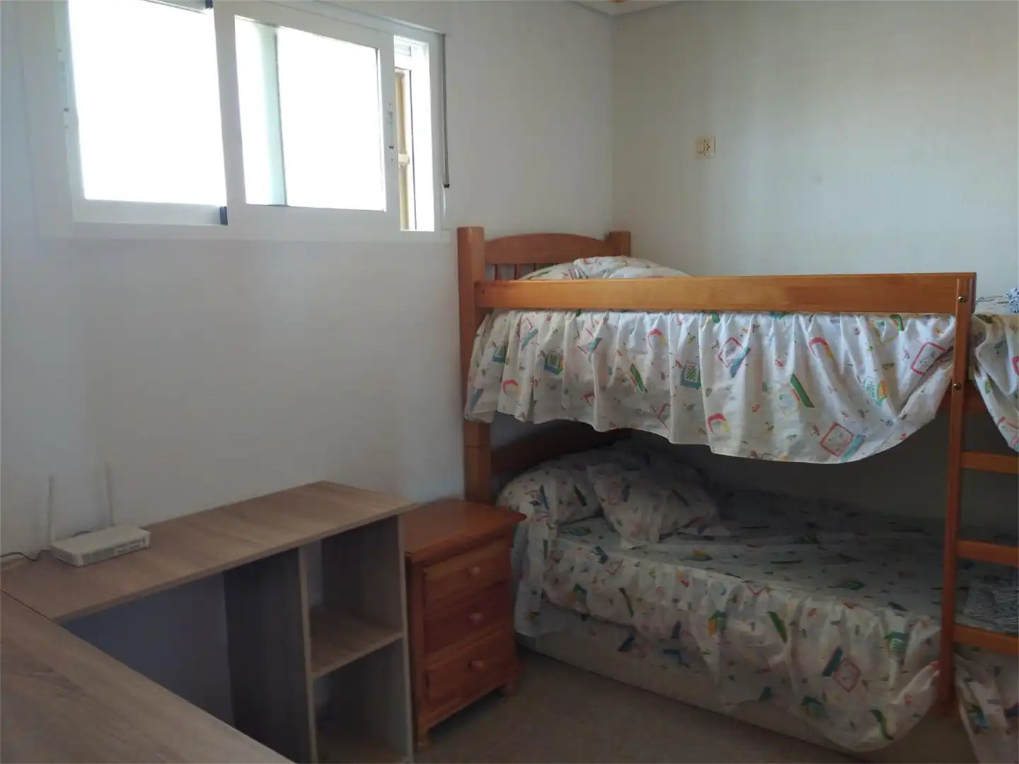 Apartament de lloguer a Edif.playa, 1, Mil Palmeras Dormitori de Apartament de lloguer en Pilar de la Horadada amb Jardí privat, Terrassa i Moblat