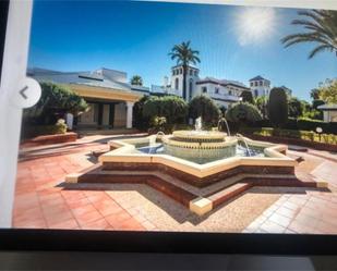 Exterior view of Single-family semi-detached for sale in Estepona  with Air Conditioner, Terrace and Swimming Pool