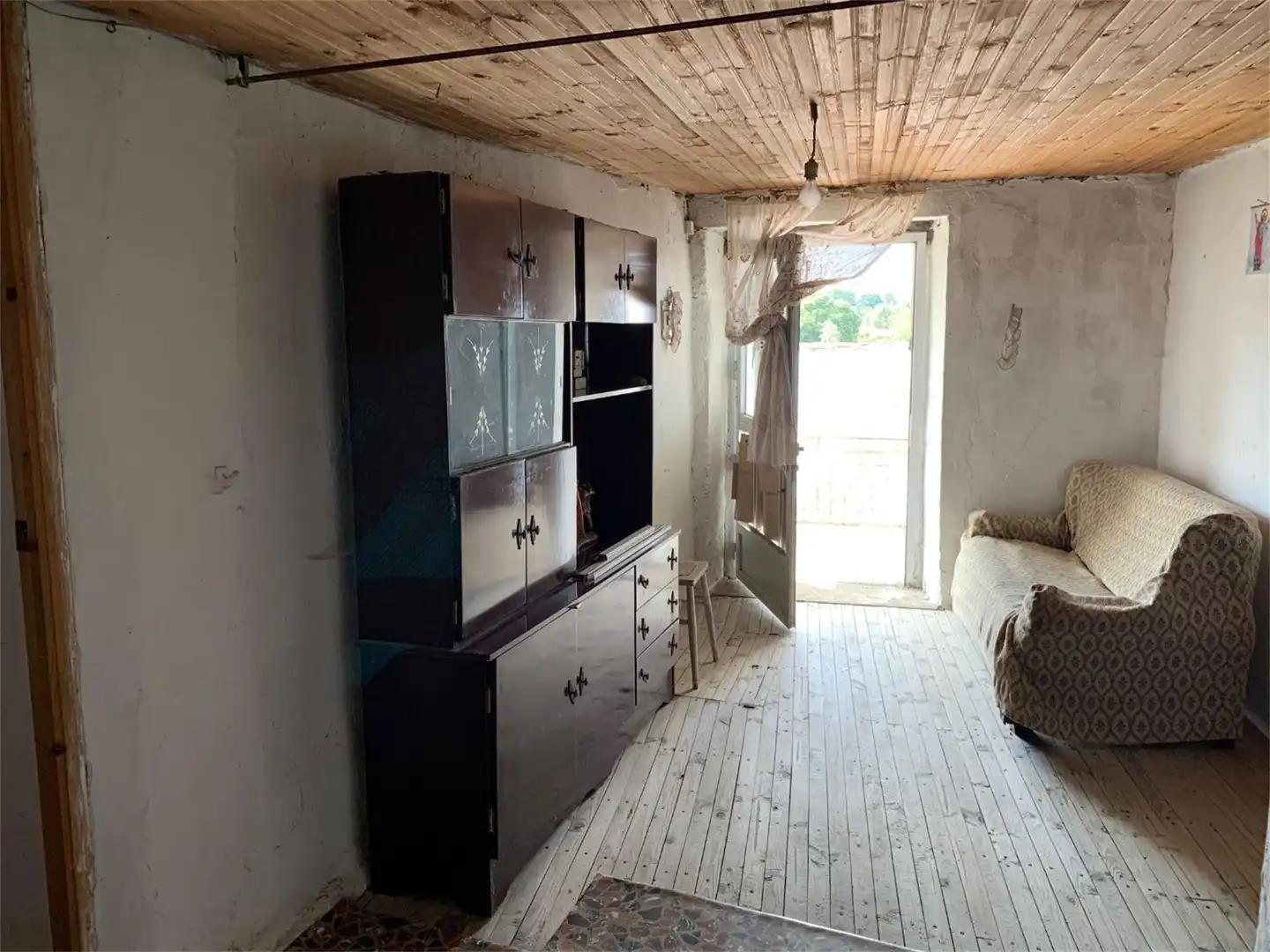 Sala d'estar de Casa adosada en venda en Pías amb Traster i Balcó