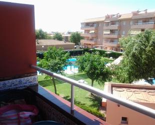 Swimming pool of Flat to rent in Chipiona  with Air Conditioner, Heating and Private garden