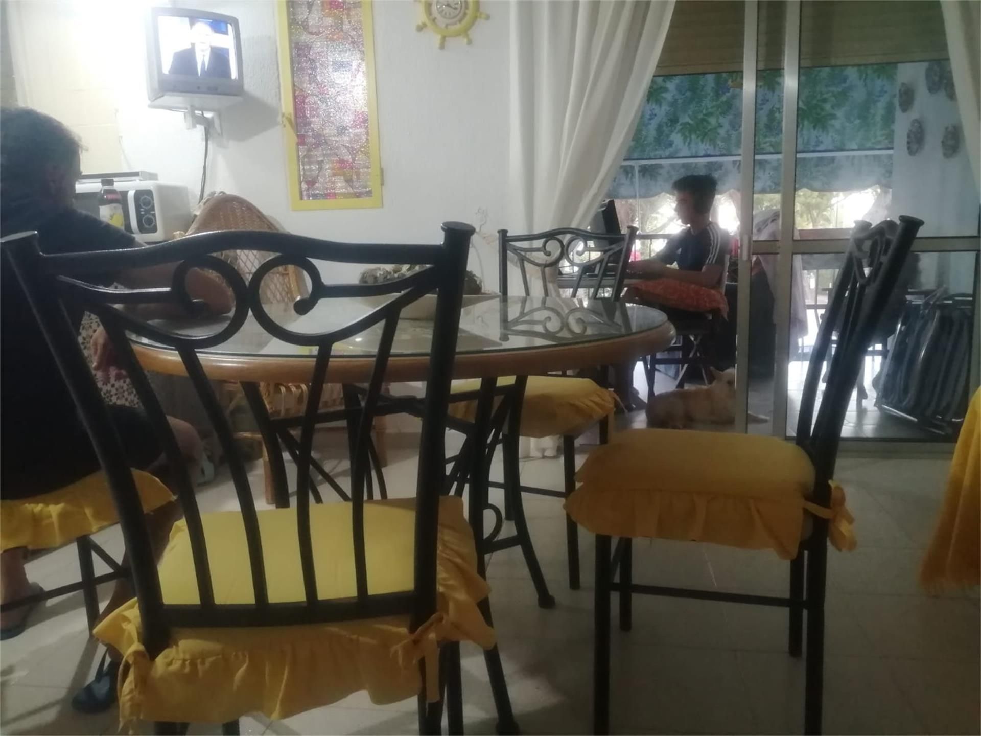 Menjador de Apartament de lloguer en El Portil amb Jardí privat, Terrassa i Moblat