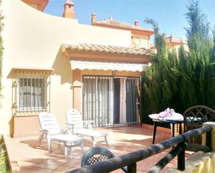 Jardí de Casa adosada de lloguer en Islantilla amb Terrassa i Piscina