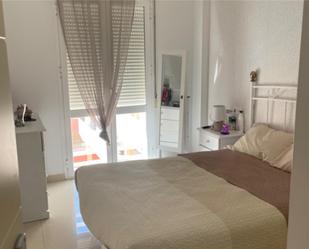 Dormitori de Apartament de lloguer en Isla Cristina amb Aire condicionat, Terrassa i Piscina