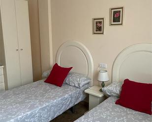 Dormitori de Casa adosada de lloguer en Isla Cristina amb Balcó