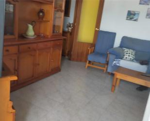 Sala d'estar de Apartament de lloguer en El Portil amb Jardí privat, Terrassa i Piscina