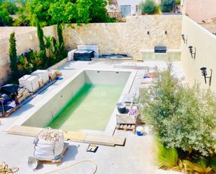 Swimming pool of Single-family semi-detached for sale in Ses Salines  with Air Conditioner, Terrace and Swimming Pool