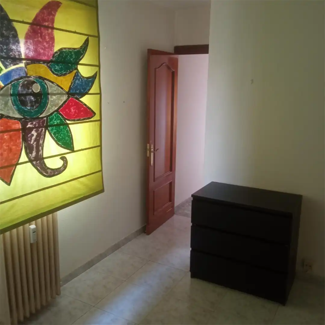 Habitación de Ático para compartir en Madrid con Calefacción y Terraza
