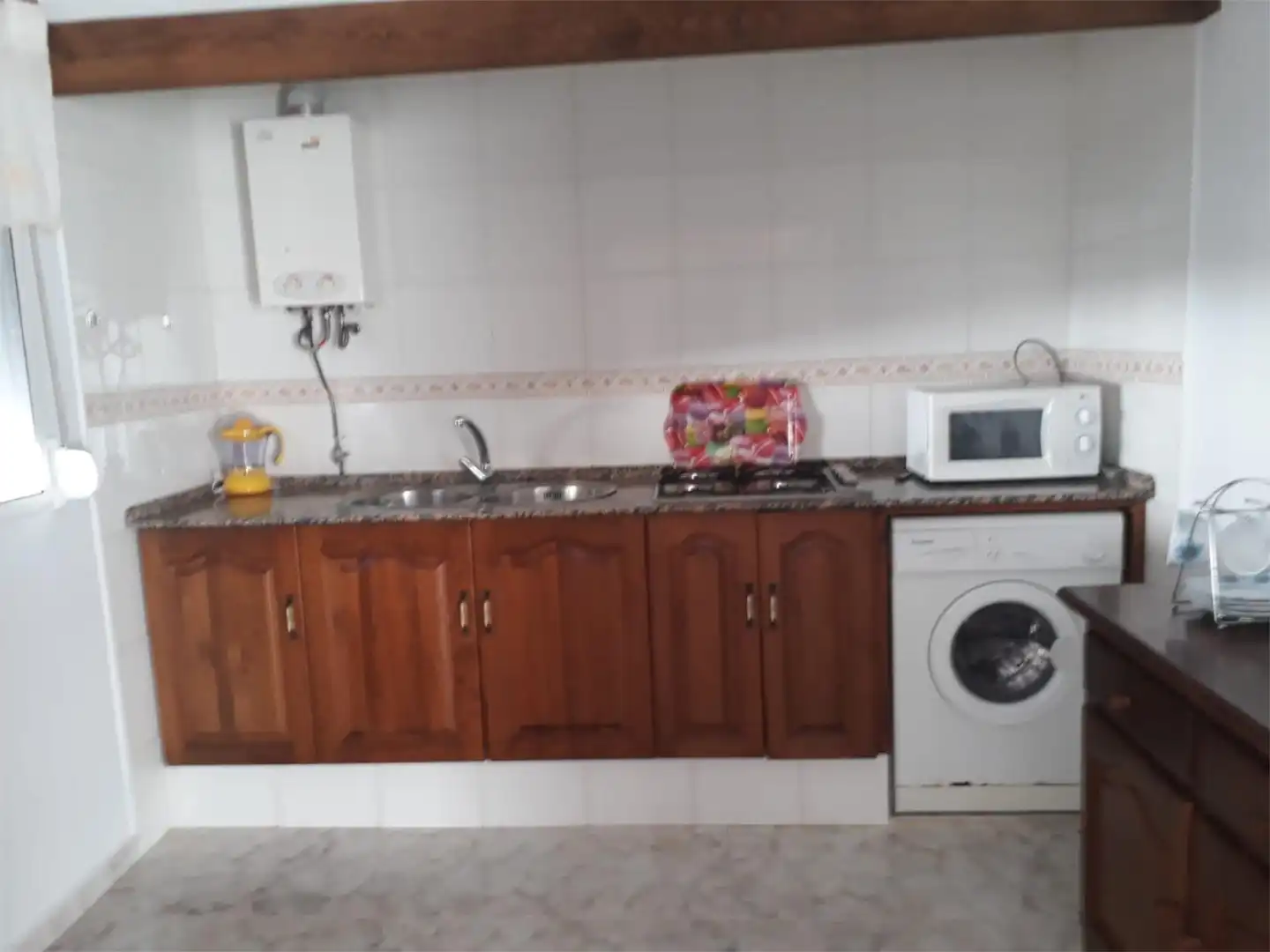 Casa adosada de lloguer a Diseminado Barrio Nuevo, 521, Barrio Nuevo Cuina de Casa adosada de lloguer en Conil de la Frontera amb Aire condicionat, Jardí privat i Terrassa