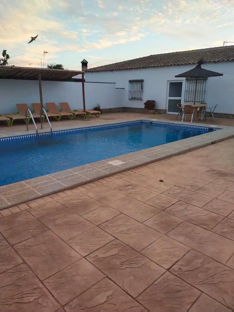 Casa adosada de lloguer a Diseminado Barrio Nuevo, 521, Barrio Nuevo Piscina de Casa adosada de lloguer en Conil de la Frontera amb Aire condicionat, Jardí privat i Terrassa