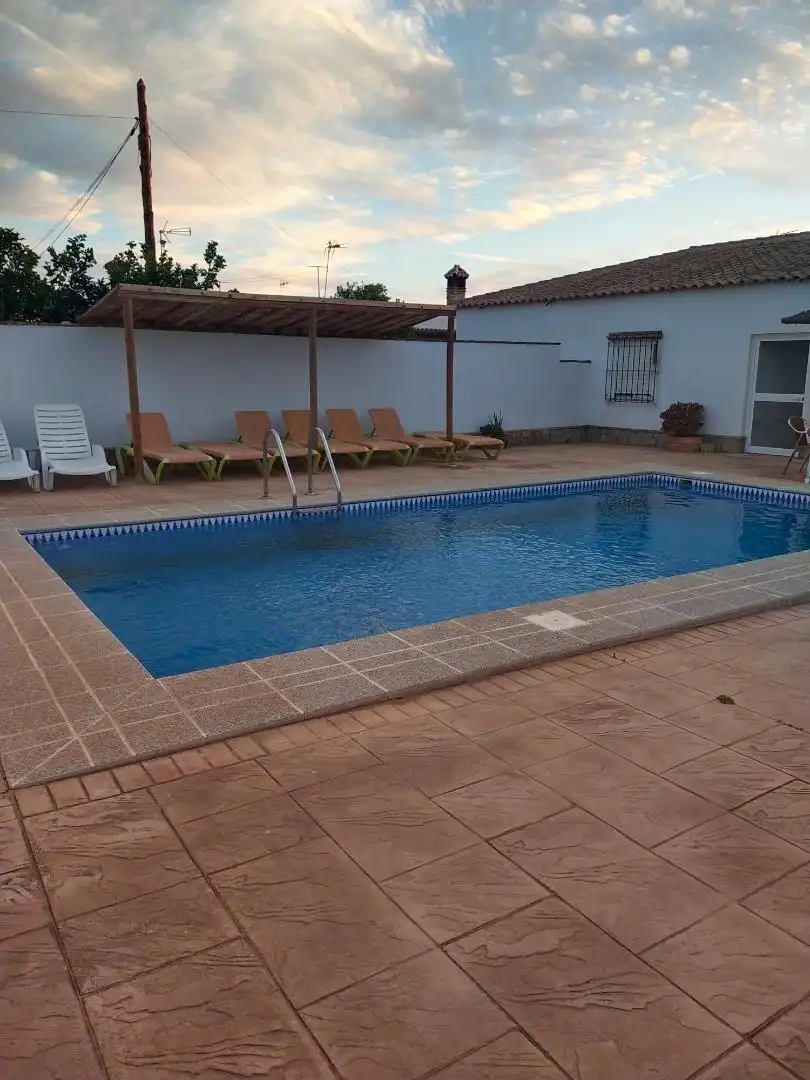 Casa adosada de lloguer a Diseminado Barrio Nuevo, 521, Barrio Nuevo Piscina de Casa adosada de lloguer en Conil de la Frontera amb Aire condicionat, Jardí privat i Terrassa