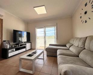 Sala d'estar de Casa adosada en venda en Benidoleig amb Aire condicionat, Terrassa i Balcó