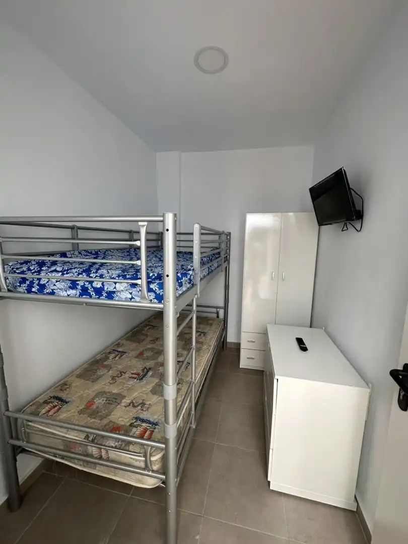 Dormitori de Casa adosada per a compartir en Rociana del Condado amb Terrassa, Moblat i Forn