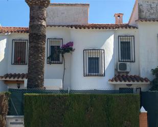 Exterior view of Single-family semi-detached for sale in Dénia  with Air Conditioner, Terrace and Swimming Pool