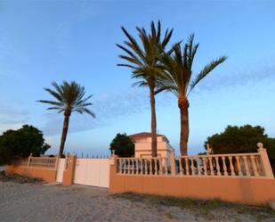 Vista exterior de Casa o xalet en venda en La Manga del Mar Menor amb Aire condicionat, Terrassa i Piscina