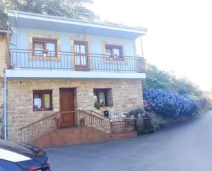 Vista exterior de Casa adosada en venda en Bimenes amb Balcó