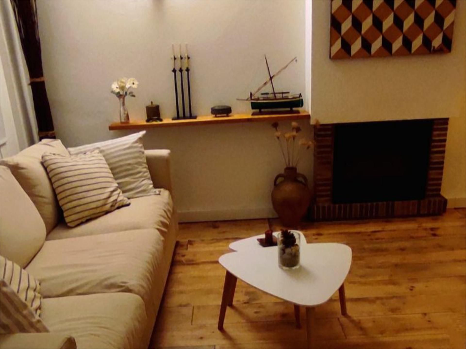 Living room of Single-family semi-detached for sale in L'Escala  with Air Conditioner, Heating and Parquet flooring