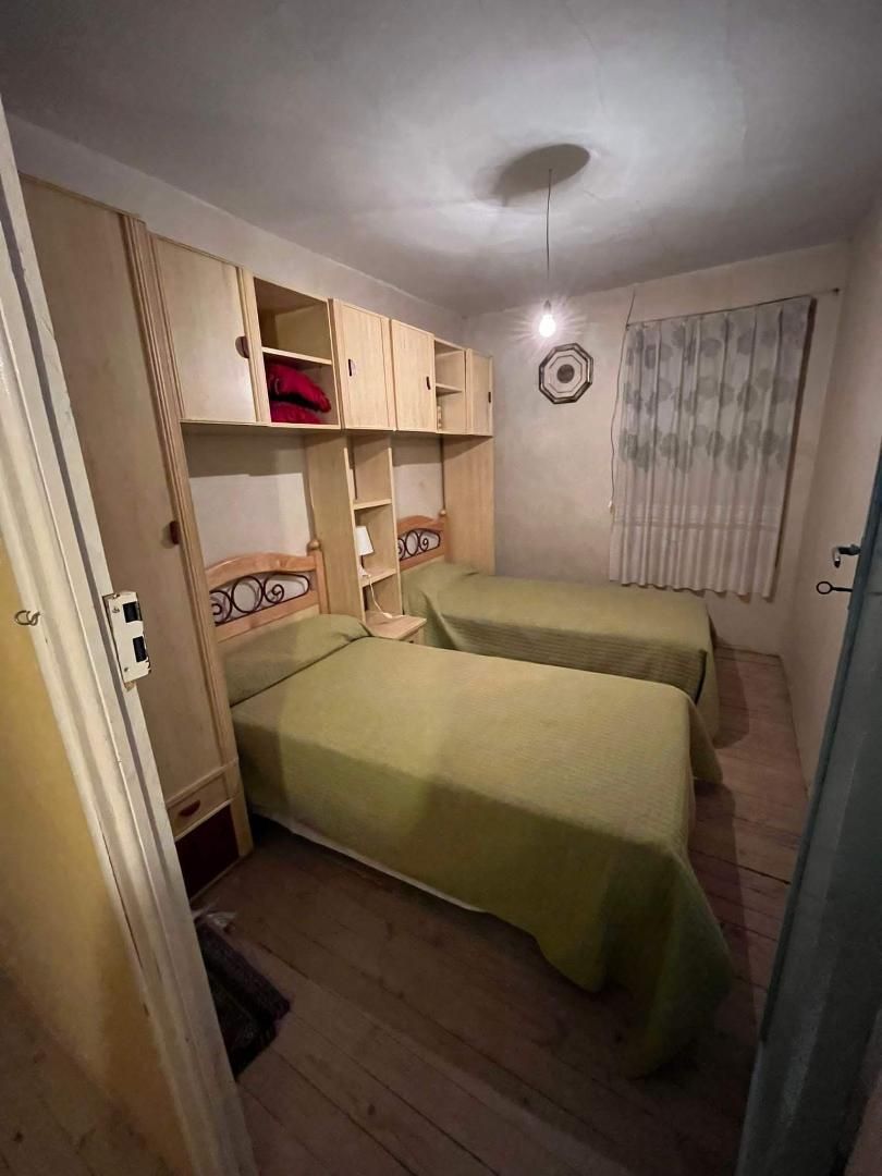 Dormitori de Casa adosada en venda en Zotes del Páramo amb Jardí privat