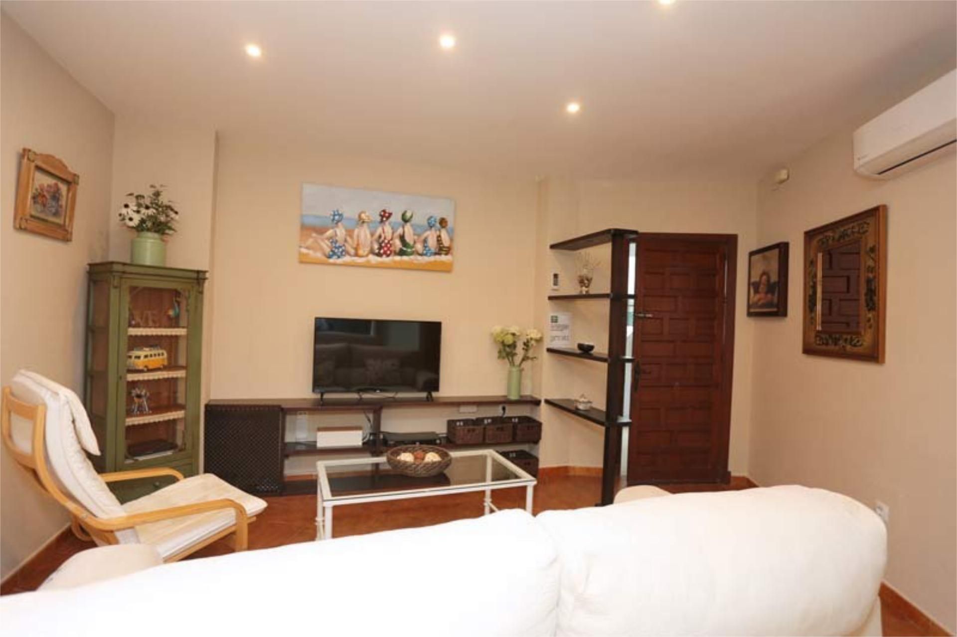 Sala d'estar de Apartament de lloguer en Conil de la Frontera amb Aire condicionat, Calefacció i Terrassa