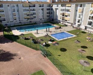 Piscina de Apartament de lloguer en El Portil amb Terrassa, Piscina i Moblat