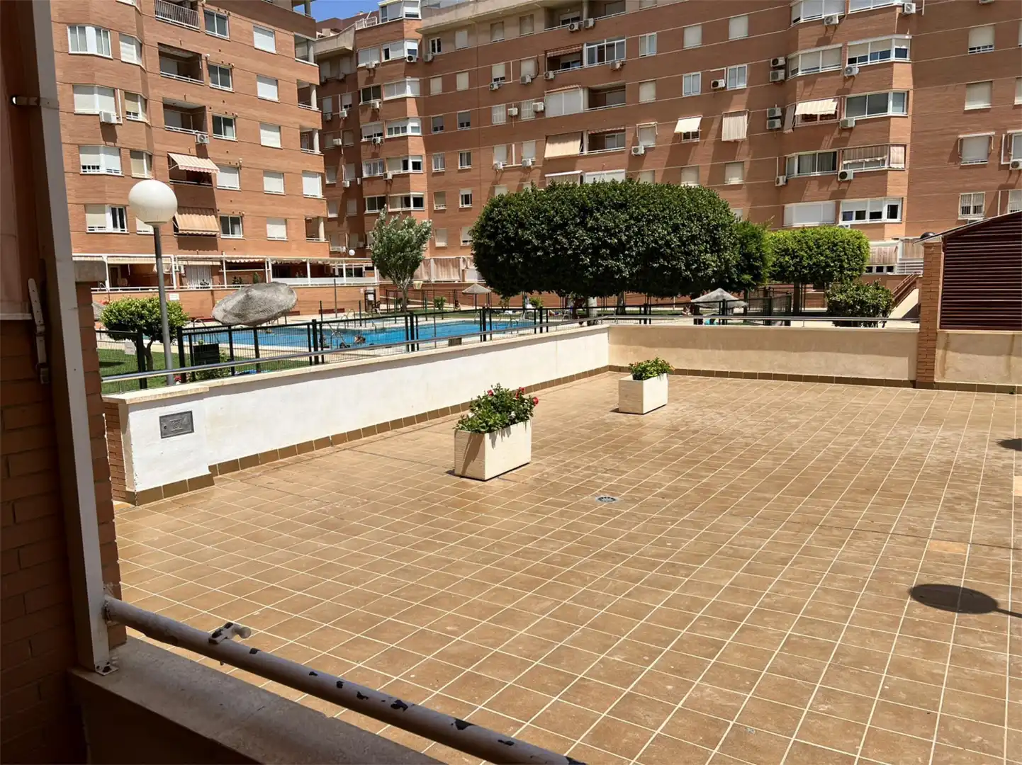 Swimming pool of Flat for sale in Almería  with Air Conditioner, Parquet flooring and Terrace
