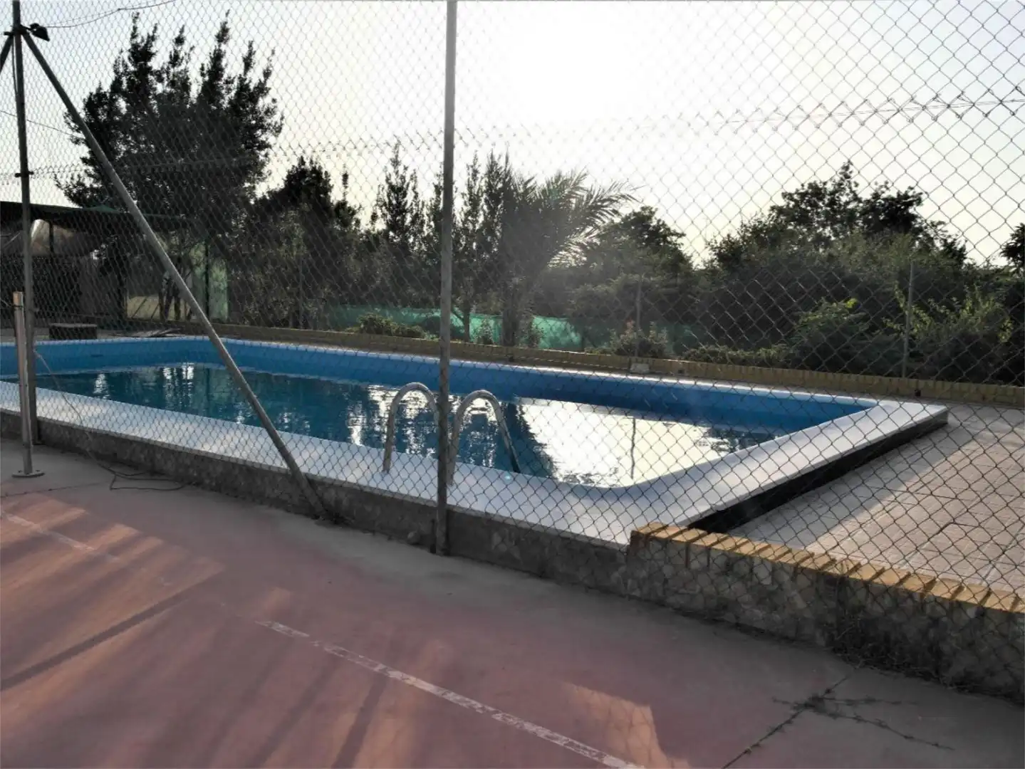 Flat for sale in Calle Huertos Familiares, 85, Puente Genil Swimming pool of Flat for sale in Puente Genil with Air Conditioner, Private garden and Terrace