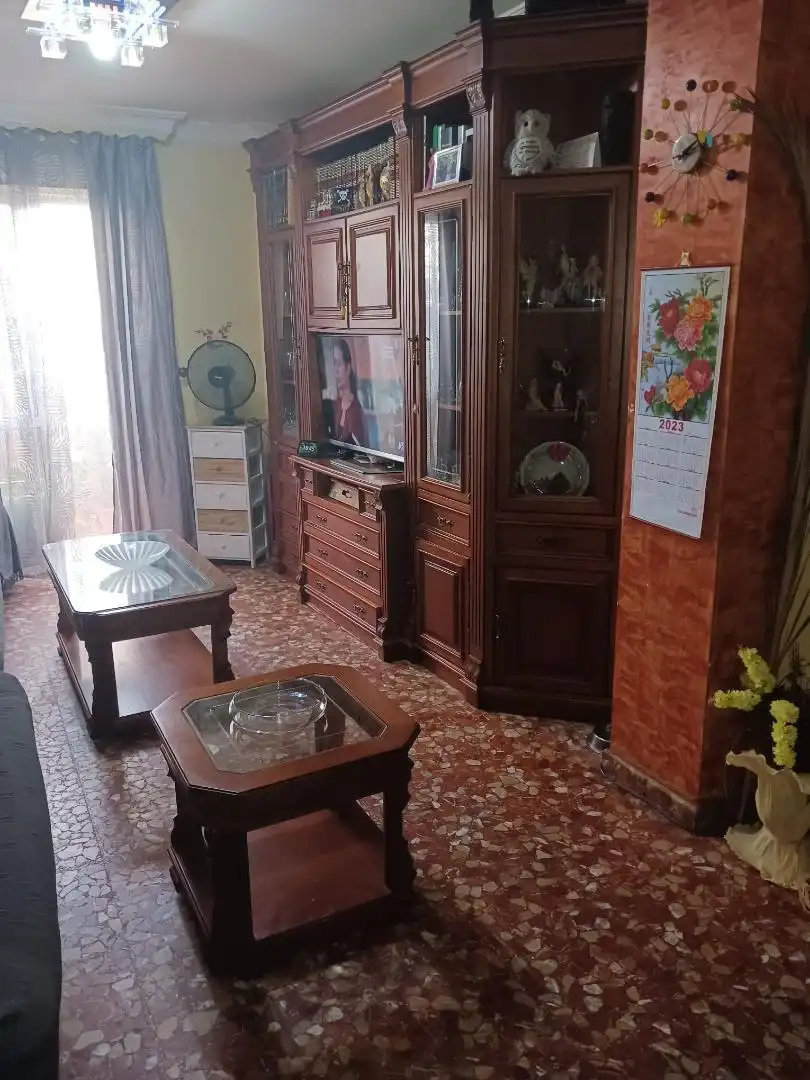 Sala d'estar de Casa adosada en venda en Alcalá de Guadaira amb Aire condicionat, Calefacció i Jardí privat