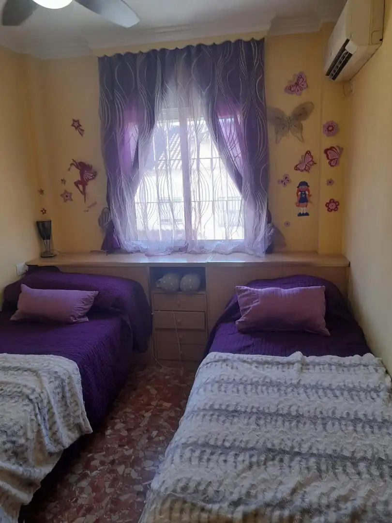 Dormitori de Casa adosada en venda en Alcalá de Guadaira amb Aire condicionat, Calefacció i Jardí privat
