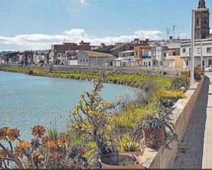 Vista exterior de Casa adosada en venda en Riola amb Terrassa i Balcó