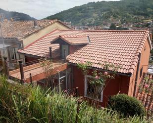 Vista exterior de Casa adosada en venda en San Martín del Rey Aurelio amb Terrassa