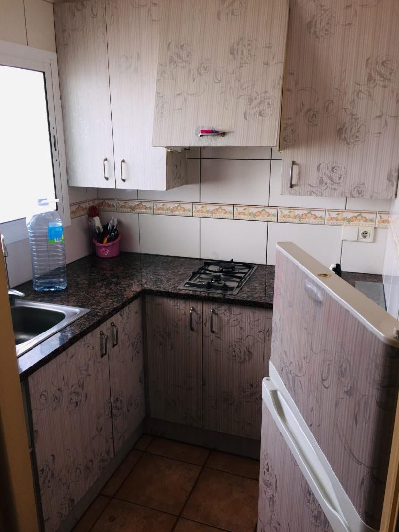 Kitchen of Flat for sale in L'Escala  with Air Conditioner and Balcony