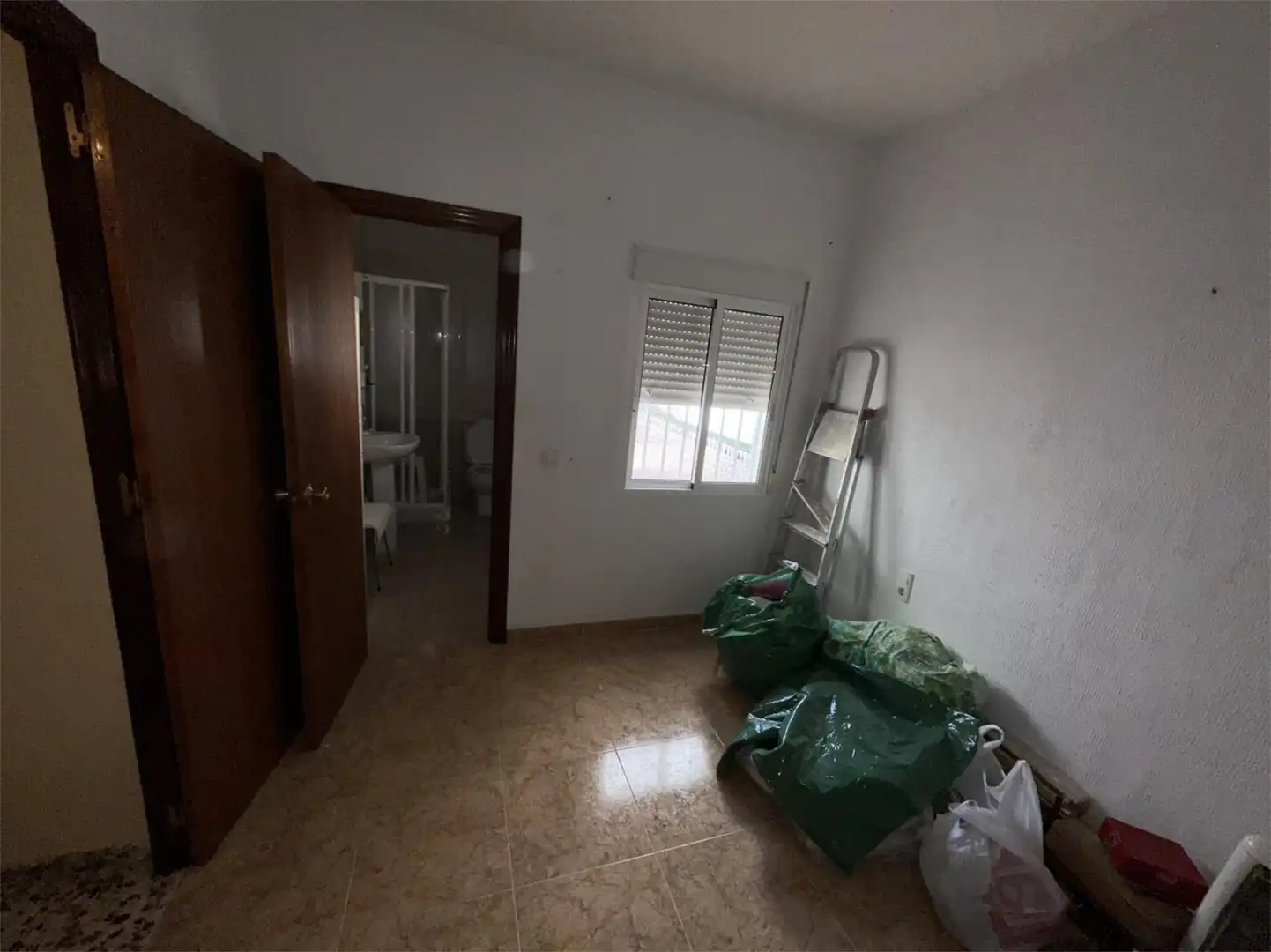Casa adosada en venda a Barriada Núcleo Residencial el Parque, 44, Rociana del Condado Dormitori de Casa adosada en venda en Rociana del Condado