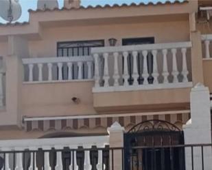 Exterior view of Single-family semi-detached for sale in El Campello  with Air Conditioner, Terrace and Swimming Pool