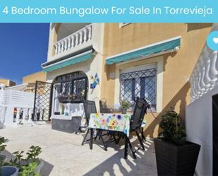 Exterior view of Single-family semi-detached for sale in Torrevieja  with Air Conditioner, Terrace and Swimming Pool