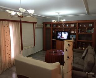 Living room of Single-family semi-detached for sale in Villacarrillo  with Air Conditioner, Terrace and Swimming Pool