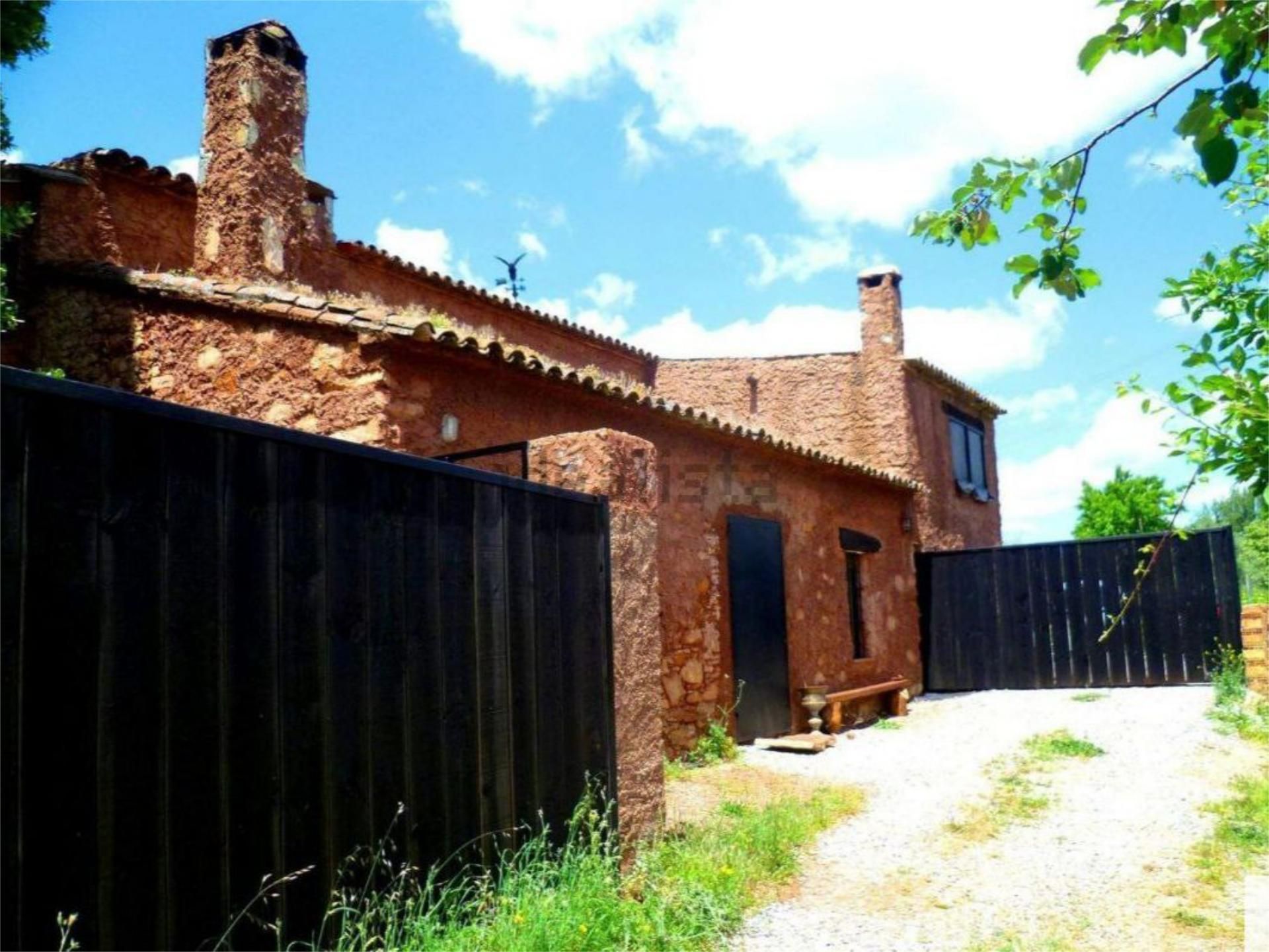Exterior view of House or chalet for sale in San Nicolás del Puerto  with Private garden, Storage room and Swimming Pool