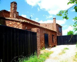 Exterior view of House or chalet for sale in San Nicolás del Puerto  with Private garden, Storage room and Swimming Pool