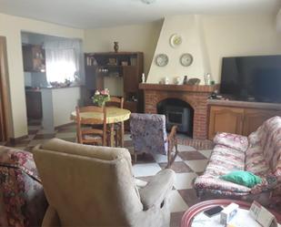 Sala d'estar de Casa adosada en venda en Cacín amb Aire condicionat